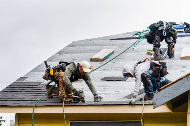 Professional Roofing technician working in Redwood City, CA